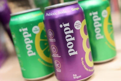 PepsiCo acquires gut-friendly soda brand Poppi for $1.65B.