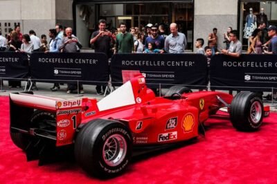 Michael Schumacher’s 2001 F1 title-winning Ferrari sells for $18M, setting a new record.
