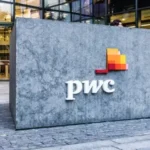 PwC announces layoffs and smaller salary raises.