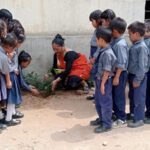 Teacher/National Awardee Mrs Sabina Teronpi observes a Plantation Drive.